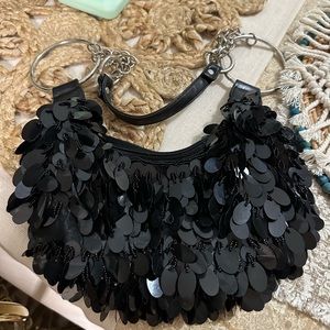 Black vintage disc fringe night out bag
